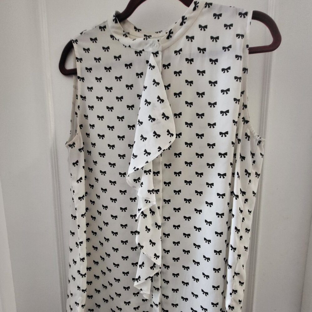 TRISTAN Bow Print Sleeveless Ruffle Blouse - White/Black - Size Large